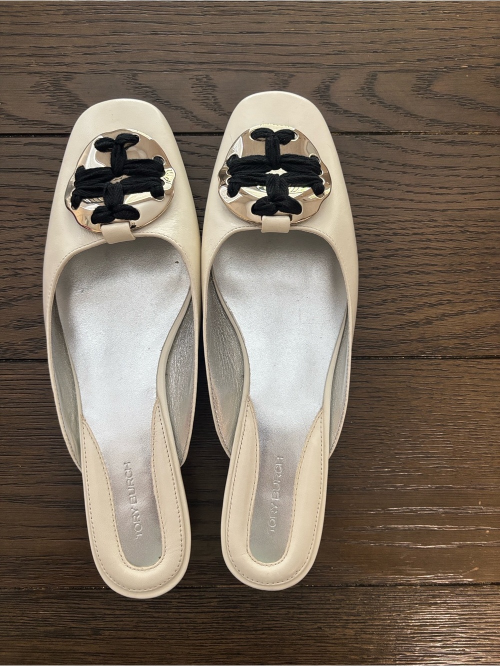 Tory Burch Cream Leather Mules with Gold Medallions and Black Cord